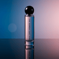Rosa 60ml perfume bottle displayed against a gradient background, showcasing its elegant design and fresh rose-like rain fragrance appeal.
