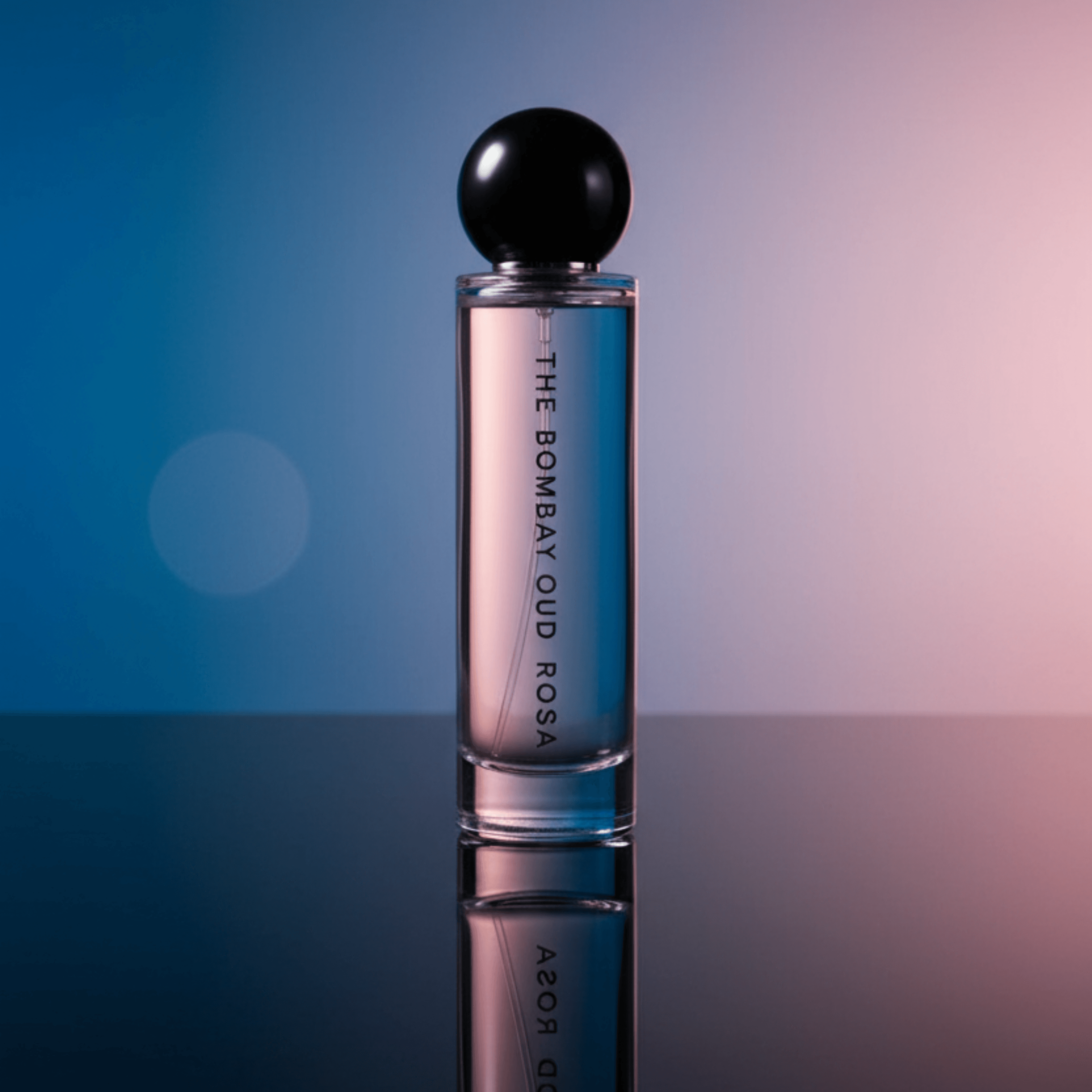 Rosa 60ml perfume bottle displayed against a gradient background, showcasing its elegant design and fresh rose-like rain fragrance appeal.