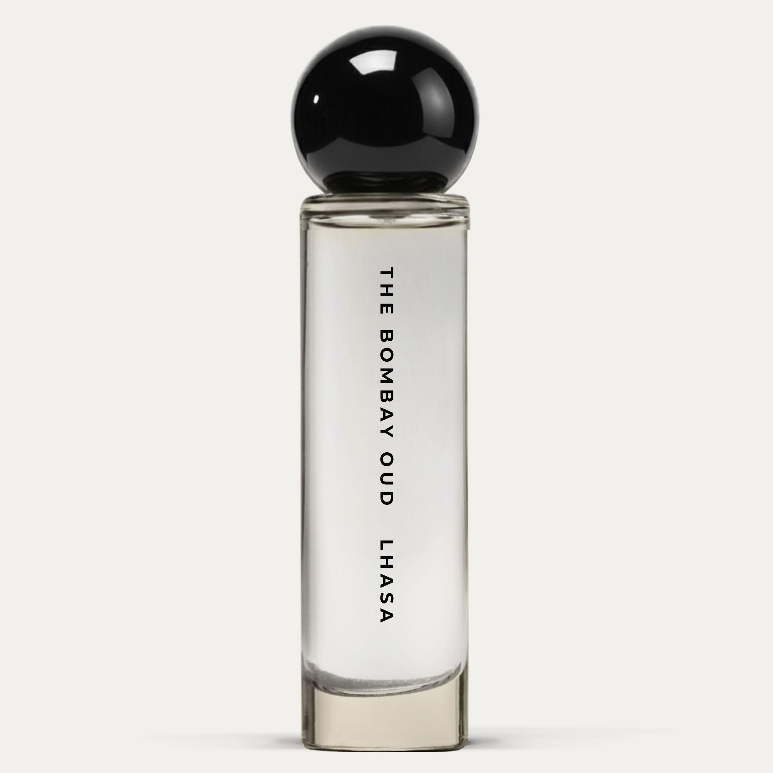 Lhasa 60ml perfume by The Bombay Oud in a sleek glass bottle with a black spherical cap, ideal for luxury fragrance lovers seeking mystique.