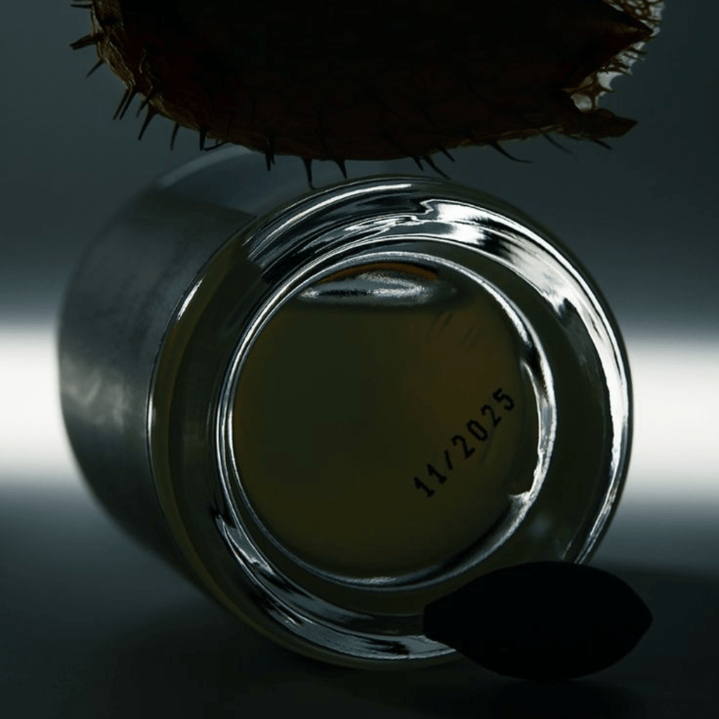 Lhasa 60ml perfume by The Bombay Oud in a sleek glass bottle with a black spherical cap, ideal for luxury fragrance lovers seeking mystique.