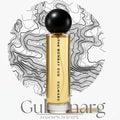 Gulmarg 60ml perfume bottle by The Bombay Oud with black spherical cap, set against a topographic Himalayan map background.