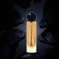 Lover 60ml perfume by The Bombay Oud showcased in a dramatic dark setting, highlighting its mysterious oud and saffron scent profile.