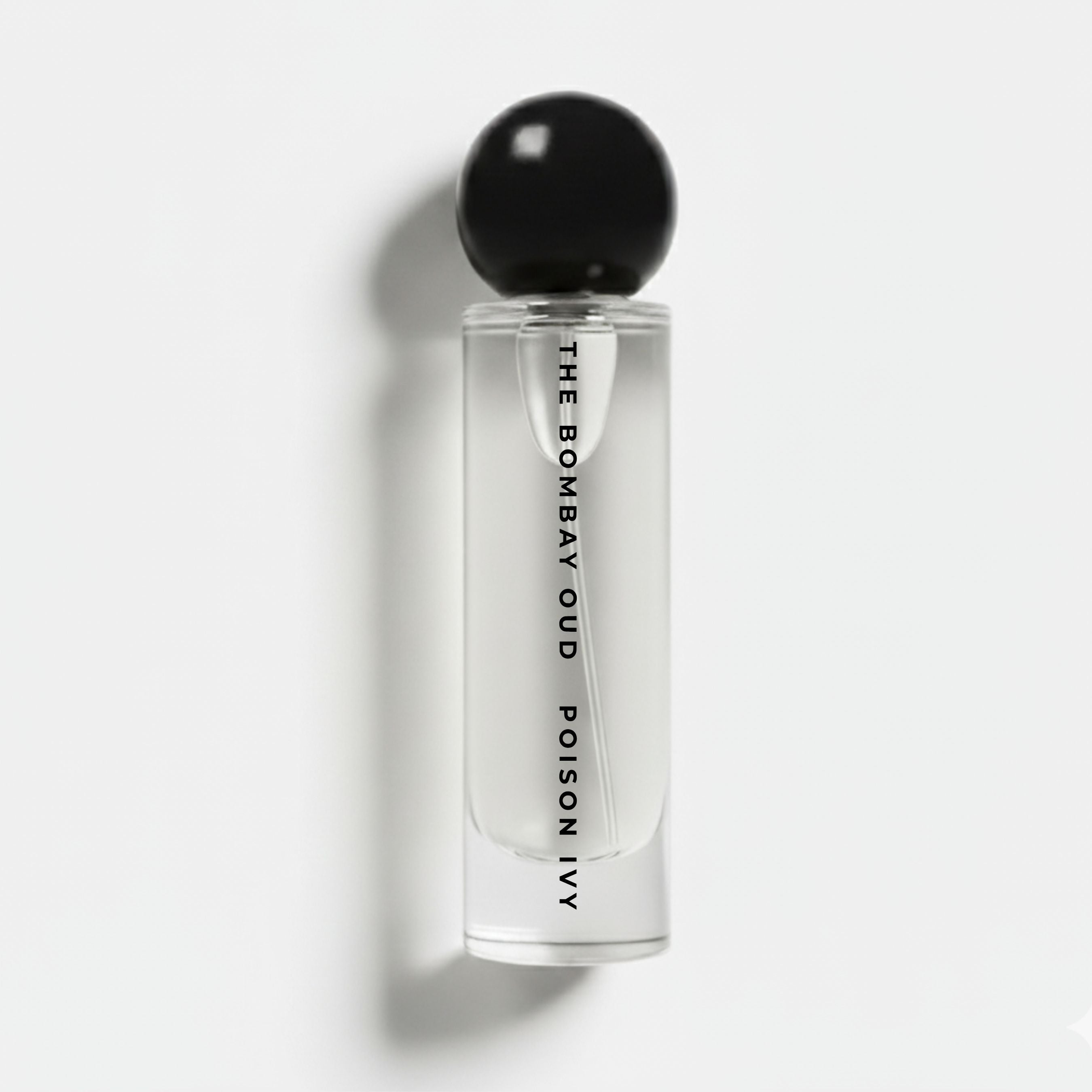 POISON IVY 60ml Eau de Parfum bottle with minimalist design and bold black cap, ideal for luxury fragrance lovers seeking rose and jasmine notes.