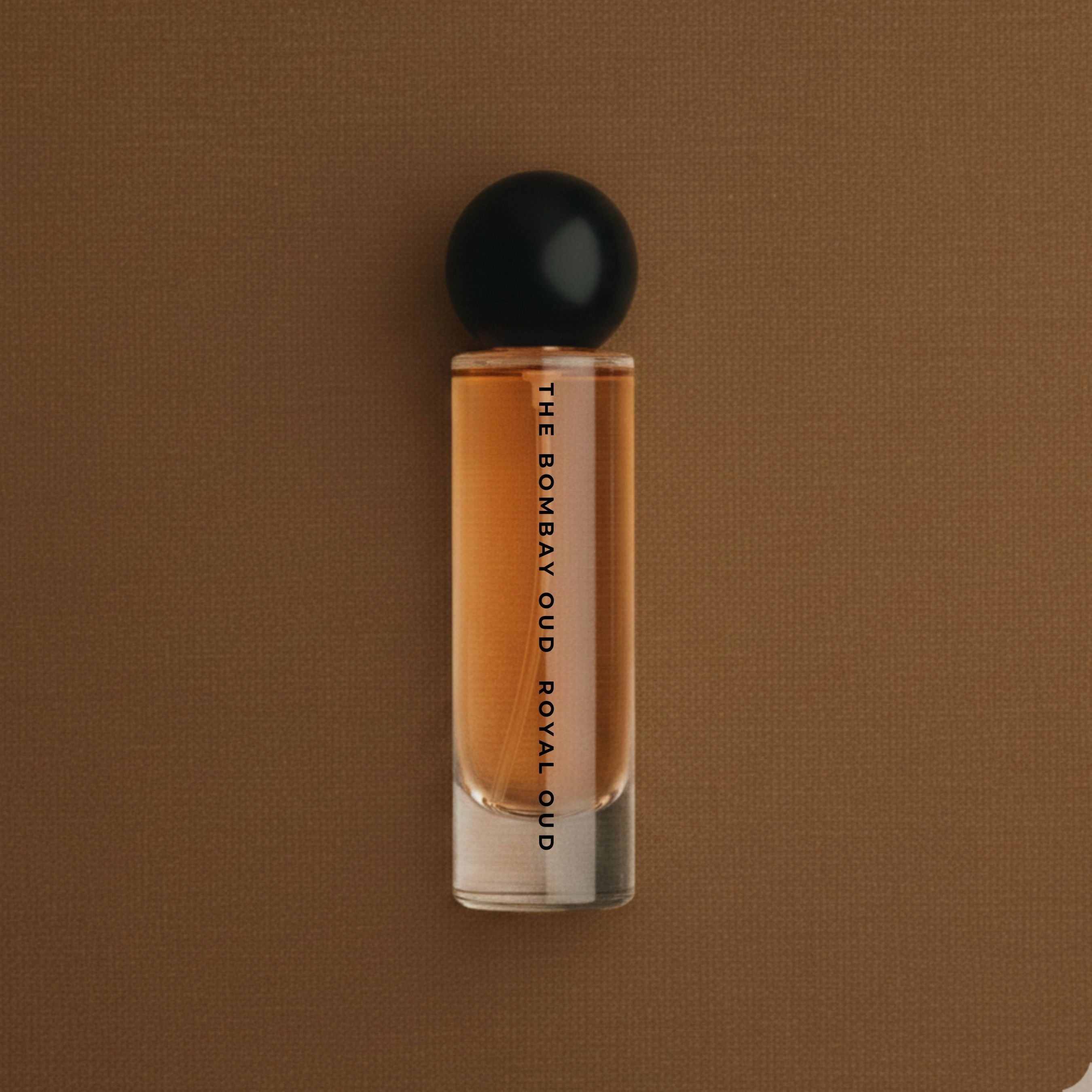 Royal Oud 60ml fragrance bottle on a brown textured background, emphasizing its elegant and refined aesthetic.